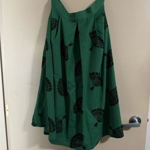 Green A-line skirt with velvet embossed.